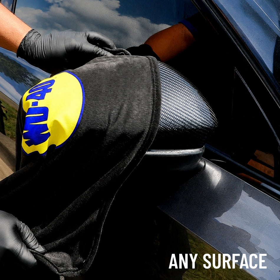 1 pack | model using towel on car mirror | 600 GSM Twist Loop Car Drying Microfiber Towel 25x36 in — WD-40, Scratch-Free & Lint-Free | L40400