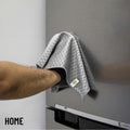 1 pack | person holding folded towel in use | 2-in-1 Multipurpose Microfiber Towel | L40180