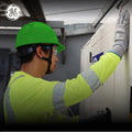 green | model wearing hard hat on jobsite | Hard Hat | Type 1, Cap Style, Dielectric, Non Vented | GH327N