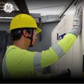 yellow | worker wearing hard hat in industrial setting | Hard Hat | Type 1, Cap Style, Dielectric, Non Vented | GH327Y