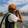 orange, Vented | model wearing helmet outdoors profile | Safety Helmet | Type 2, Vented with Koroyd® | GH500O