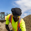 carbon black, Vented | model wearing helmet on construction site | Safety Helmet | Type 2, Vented with Koroyd® | GH500CB