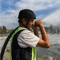 black, Vented | model wearing helmet outdoors waterside | Safety Helmet | Type 2, Vented with Koroyd® | GH500BK