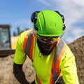 green, Vented | model wearing helmet in construction site | Safety Helmet | Type 2, Vented with Koroyd® | GH500GN