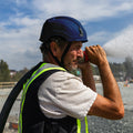 blue, Vented | model wearing helmet on job site | Safety Helmet | Type 2, Vented with Koroyd® | GH500B
