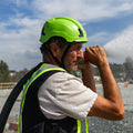 green, Vented | model wearing helmet outdoors waterside | Safety Helmet | Type 2, Vented with Koroyd® | GH500GN