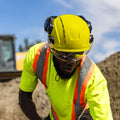 yellow, Vented | model wearing helmet on construction site | Safety Helmet | Type 2, Vented with Koroyd® | GH500Y