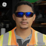 black/blue, Blue Mirror Anti-Fog | model wearing sunglasses with blue mirror lenses | Full Frame Safety Glasses — GE PPE 04 Series, Anti-Fog, ANSI Z87.1 | GE104BAF