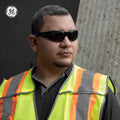 black/blue, Smoke Anti-Fog | model wearing frameless glasses outdoors | Frameless Safety Glasses — GE PPE 05 Series, ANSI Z87.1 & EN 166 | GE205SAF