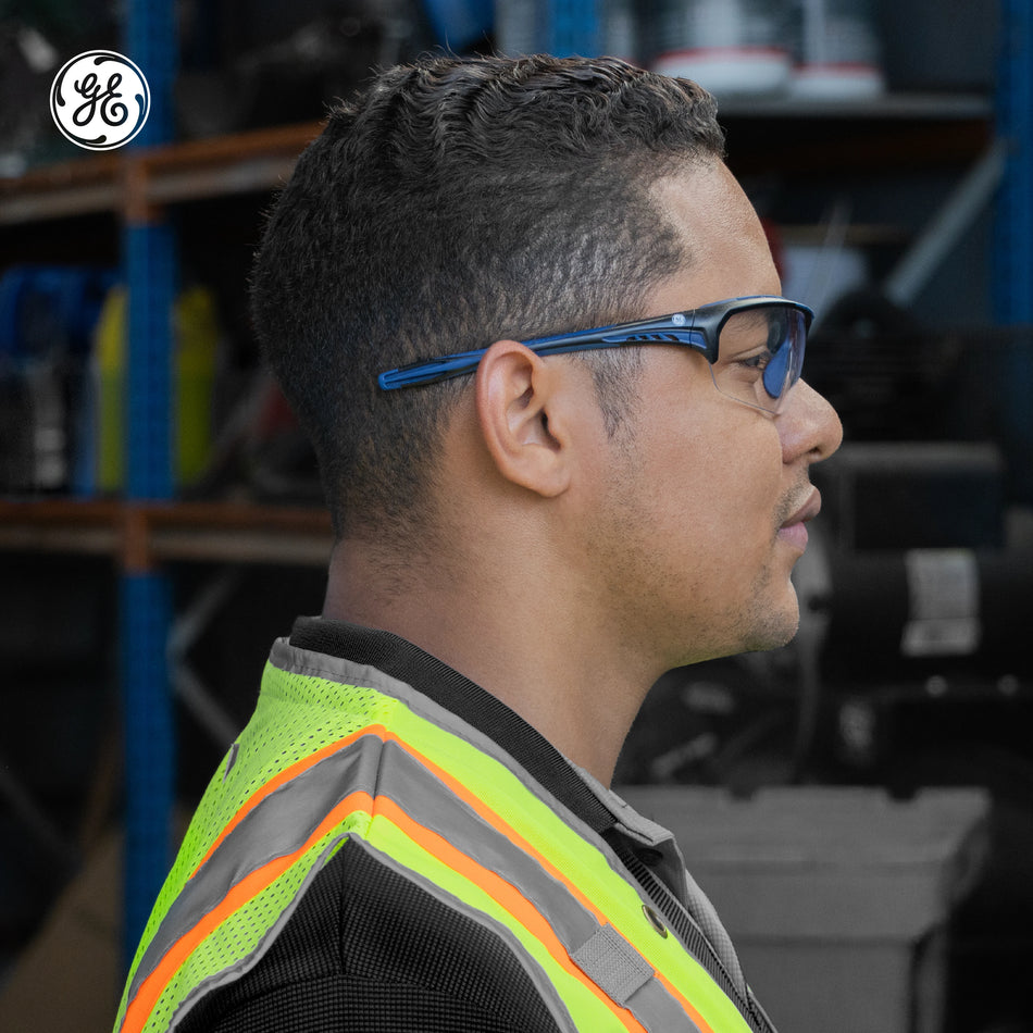 black/indigo, Clear Anti-Fog | side profile view with industrial background | Anti-Fog Wrap-Around Safety Glasses — GE PPE 09 Series, ANSI Z87.1 & EN 166 | GE109CAF