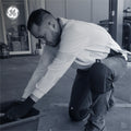 black | man wearing knee pads during work activity | Low-Profile EVA Foam Knee Pads — GE PPE GR550, EN14404 Type 2 | GR550