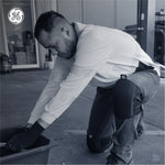 black | man wearing knee pads during work activity | Low-Profile EVA Foam Knee Pads — GE PPE GR550, EN14404 Type 2 | GR550