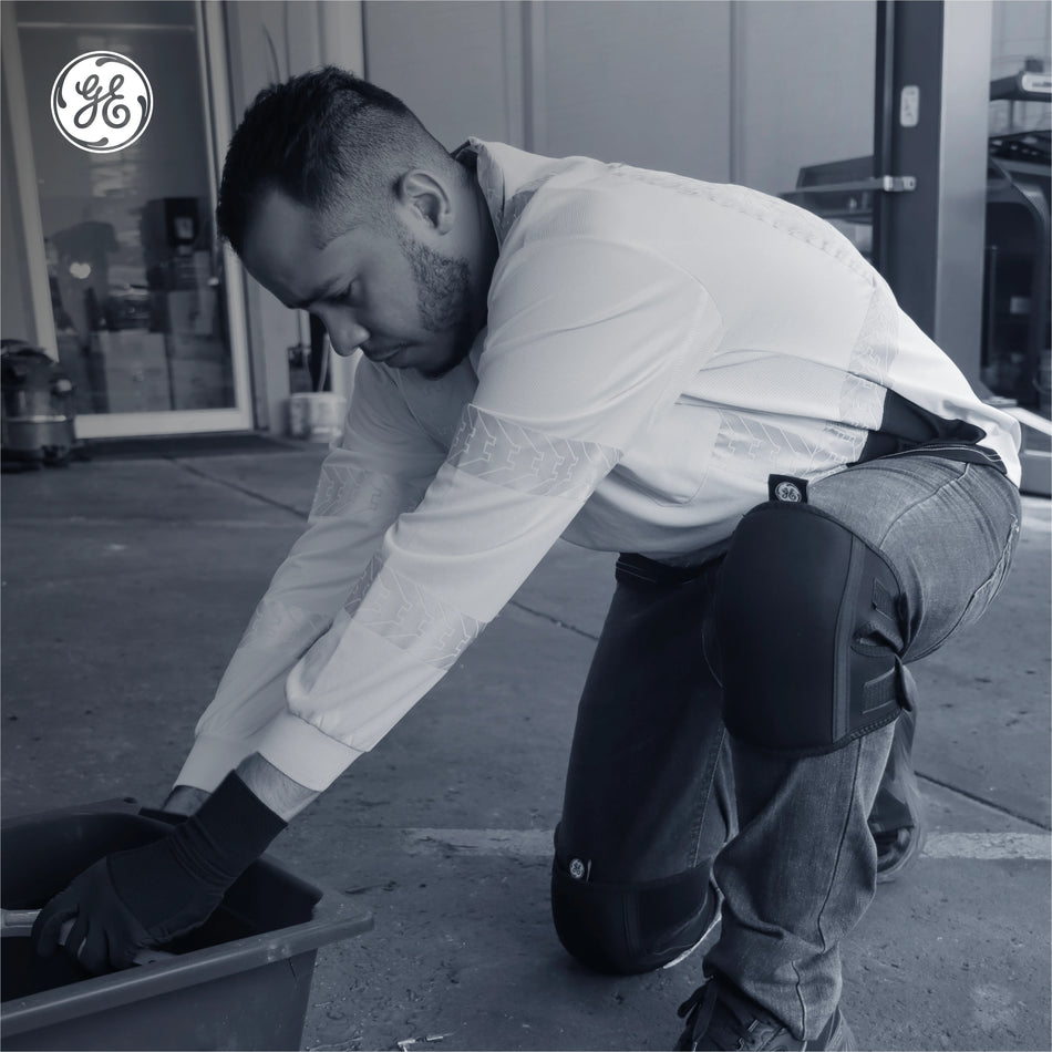 black | man wearing knee pads during work activity | Low-Profile EVA Foam Knee Pads — GE PPE GR550, EN14404 Type 2 | GR550