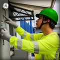green | model wearing hard hat on jobsite | Cap Style Hard Hat — GE PPE GH327, ANSI Z89.1-2014 Type 1 Class E Dielectric | GH327N