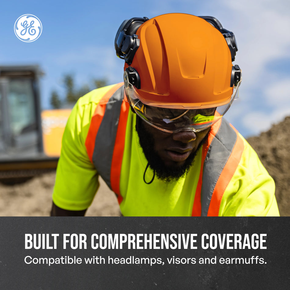 orange, Non-Vented | model wearing helmet on construction site | Non-Vented Type 2 Safety Helmet with Koroyd — GE PPE GH501, ANSI Z89.1-2014 Class E & G | GH501O