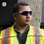 white/blue, Blue Mirror Anti-Fog | model wearing safety glasses outdoors | Wrap-Around Safety Glasses — GE PPE 10 Series, Anti-Fog, ANSI Z87.1 | GE110BAF