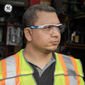 white/blue, Clear Anti-Fog | model wearing safety glasses side view | Wrap-Around Safety Glasses — GE PPE 10 Series, Anti-Fog, ANSI Z87.1 | GE110CAF